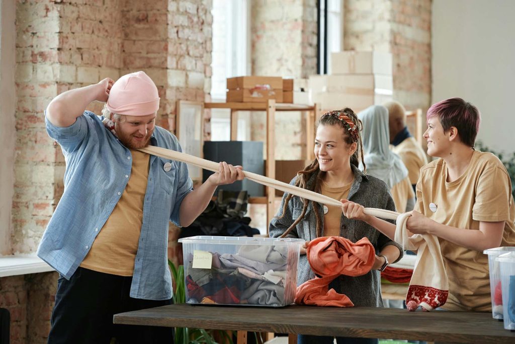 Young Students working together with colorful fabric.